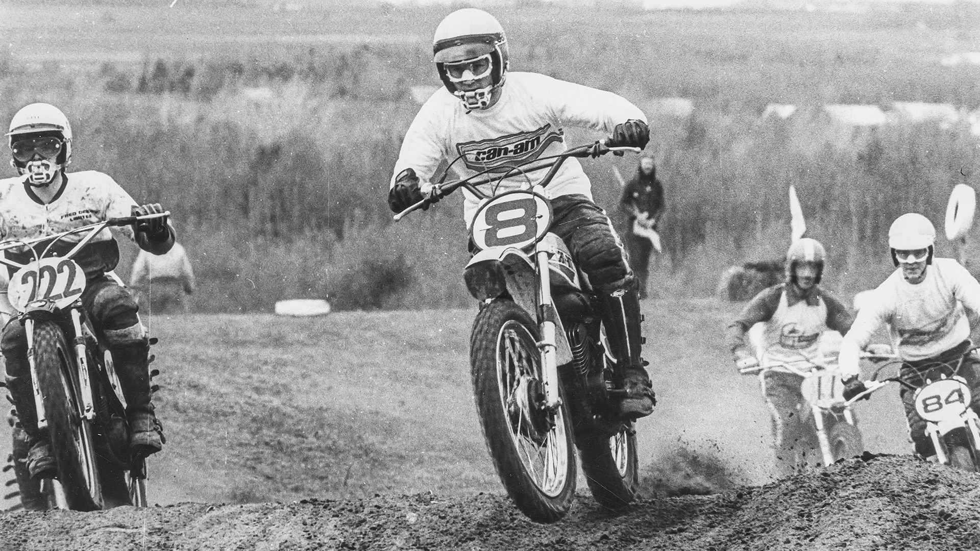 Riders racing their Can-Am motorcycles