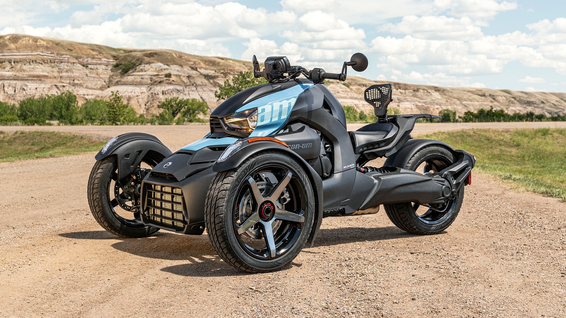 Side View of a Can-Am Ryker on a dirt road